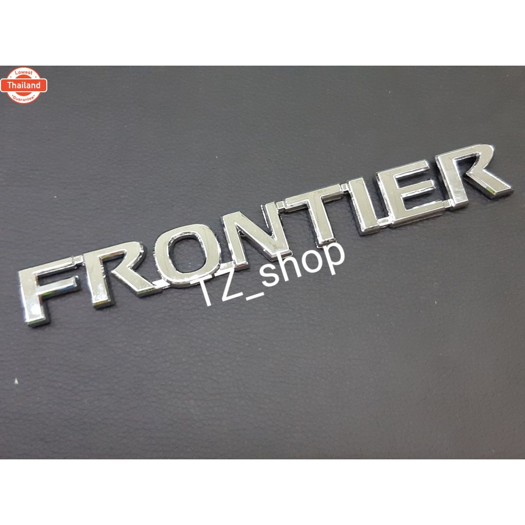 โลโก้ frontier ของรถ nissan navara