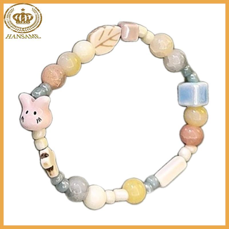 ฮันทําด้วยมือสร้อยข้อมือลูกปัดเซรามิกที่ไม่ซ้ํากันกระต่ายน่ารัก Handchain ประณีตยืดหยุ่นสร้อยข้อมือล