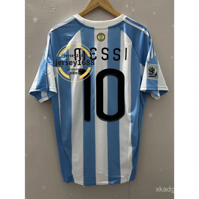 เสื้อฟุตบอลย้อนยุค 2010 อาร์เจนตินา เสื้อฟุตบอลเหย้าคุณภาพสูง MESSI เสื้อยืดที่กําหนดเอง