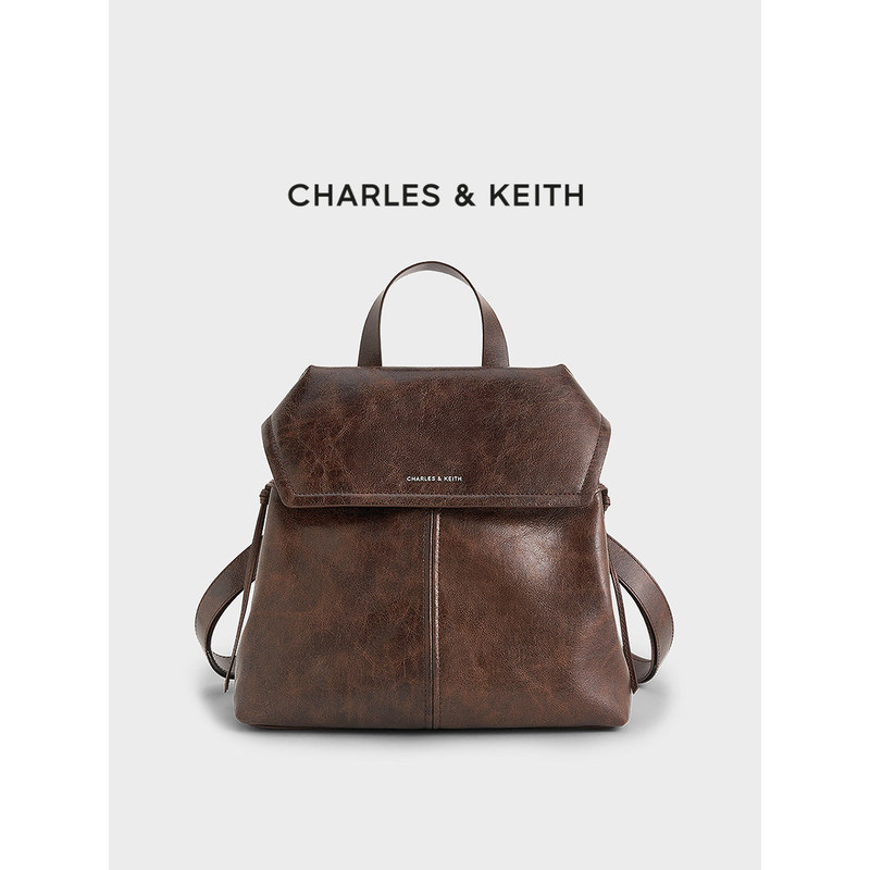 CHARLES & KEITH กระเป๋าเป้สะพายหลัง Noane Backpack รุ่น CK2-60671790 สำหรับผู้หญิง สี Distressed Coffee และ Noir