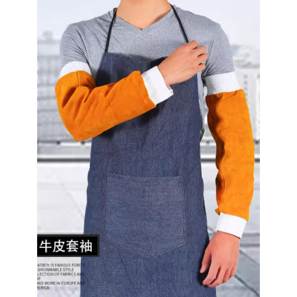 Cowhide เชื่อมแขนป้องกัน Anti-Scalding เครื่องเชื่อมข้อศอก Anti-Scalding ฉนวนกันความร้อนทนอุณหภูมิสูง Fire-Proof ลวดป้องกันแขนป้องกันแรงงาน ZNV5 baju