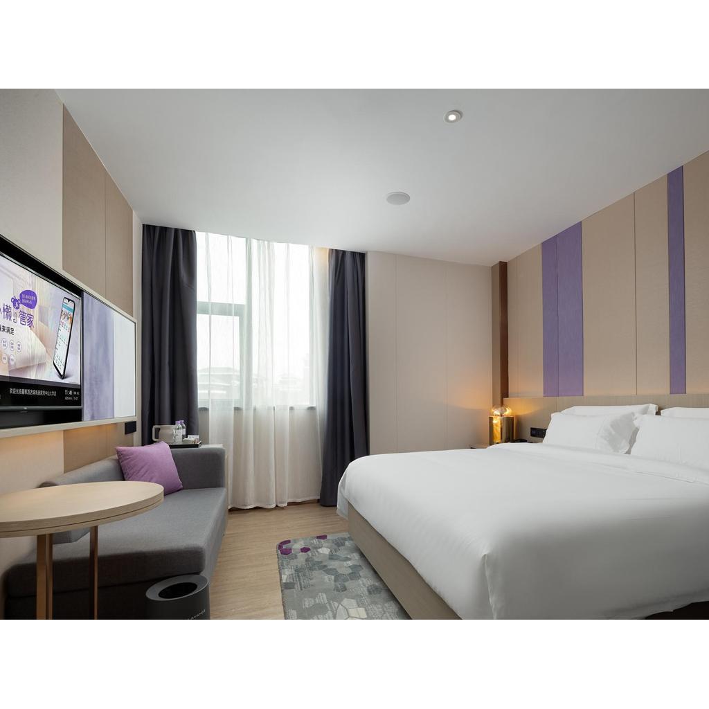 โรงแรมหลี่เฟิง (Zhuhai Couple North Road Tangs Bay Beach Shop) ธุรกิจห้องนอนใหญ่