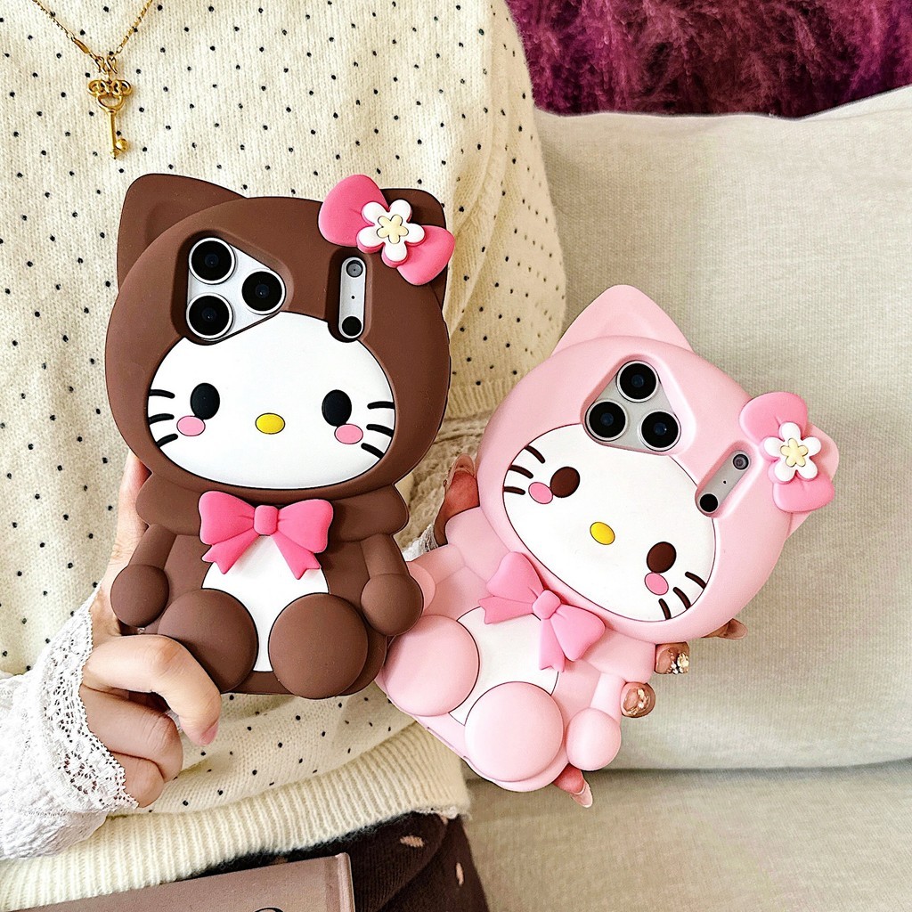 ผิวรู้สึกซิลิโคนการ์ตูนน่ารักท่านั่งโบว์ KT Cat iPhone17 Apple 16 เหมาะสําหรับ 14/15pro max เคสโทรศัพท์ 13