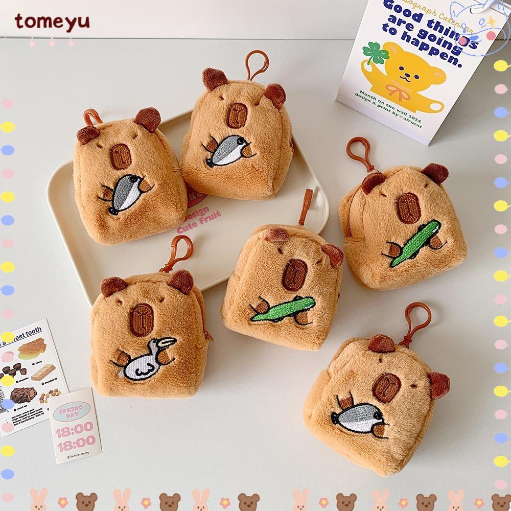 กระเป๋าใส่เหรียญและหูฟังแบบตุ๊กตาคาปิบาร่า anime พวงกุญแจสำหรับนักเรียนจาก TOMEYU