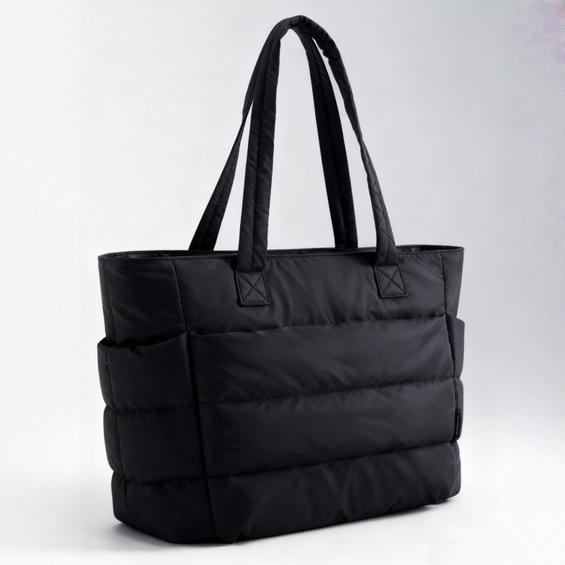 กระเป๋า ถือสุภาพสตรีแฟชั่นกันน้ําTote Bag กระเป๋าบุนวมลําลอง กระเป๋าสะพายไหล่ผู้โดยสารความจุสูงกัน ใส่โน๊ตบุคเข้าไปก็ได้