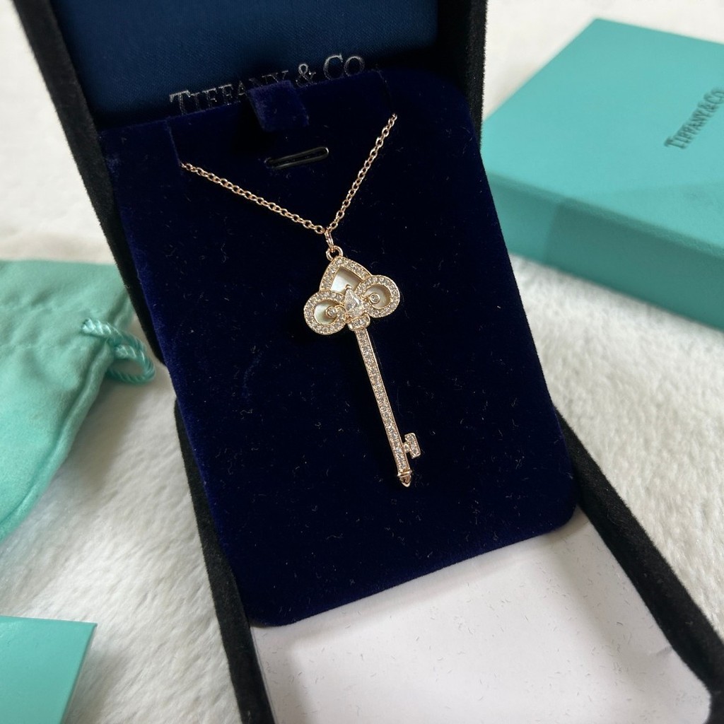 Iris สร้อยคอกุญแจเปลือกหอยสีขาวสร้อยคอผู้หญิง