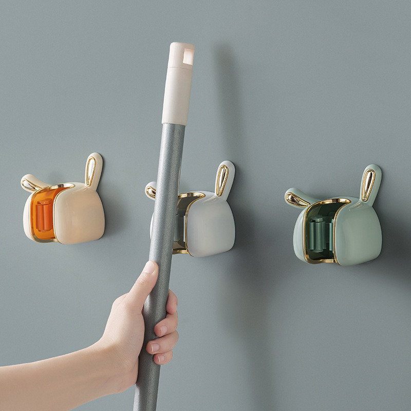[Spot Goods]No-drill bathroom broom hook  Luxury Bunny Mop Holder Household Bathroom Adhesive Broom 