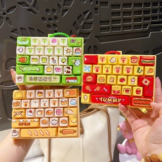 พวงกุญแจตัวคลิกไดอารี่สัตว์น่ารักพร้อมการออกแบบแป้นพิมพ์ 26 ตารางถุงบีบอัดเสน่ห์