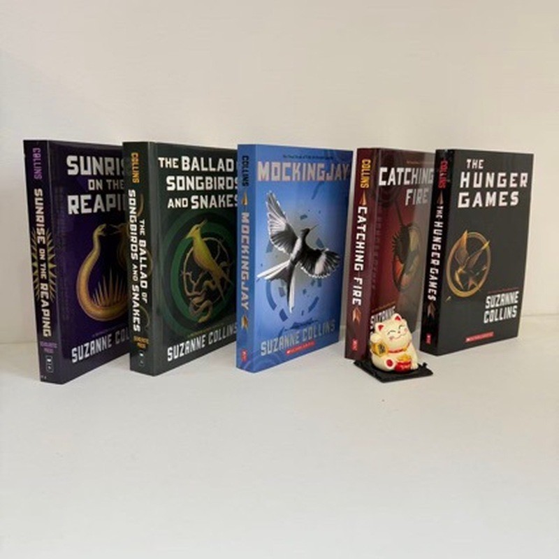 The Hunger Games The Hunger Games The Hunger Games ภาษาอังกฤษ 1 Little Dragon Girl Dragon Game Fire 