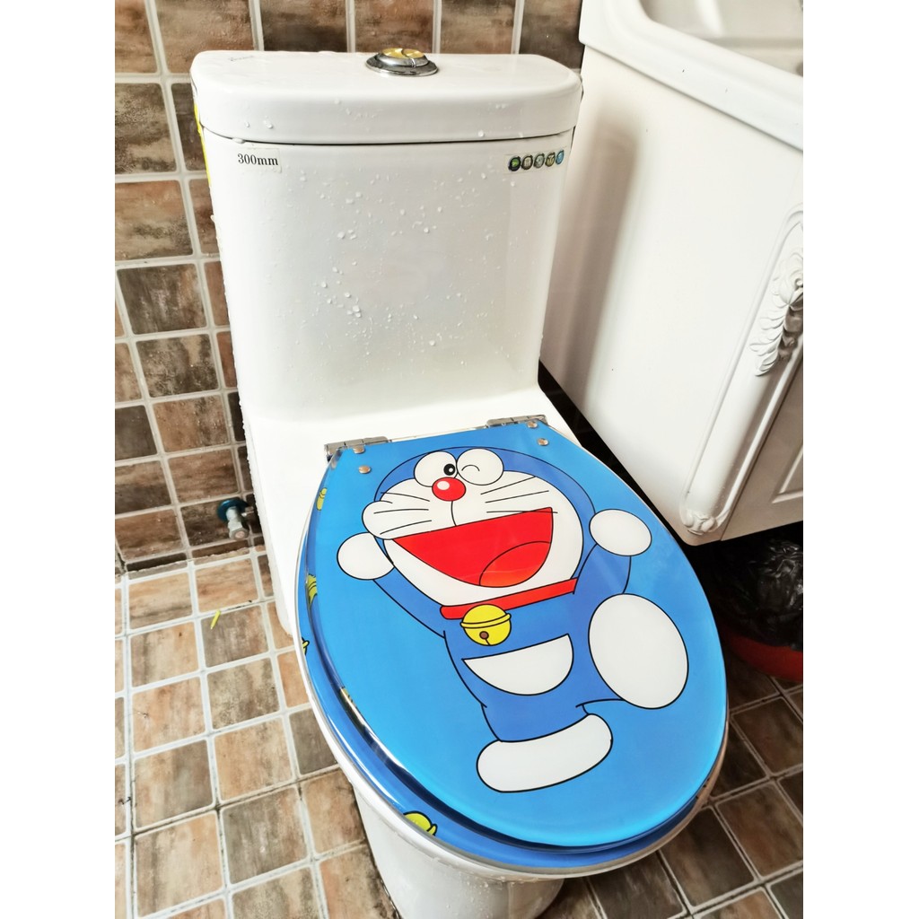 ฝาชักโครก ฝาชักโครก karat ฝาชักโครก cotto สากลโดราเอมอนห้องน้ําปกครัวเรือนเรซิ่นกันกระแทกห้องน้ําปกห