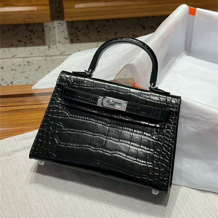 ลายจระเข้ Kelly Bag กระเป๋าสะพายข้างแบบพกพา MINI MINI Cowhide 2026 Same Style Kelly Texture Bag อินเ