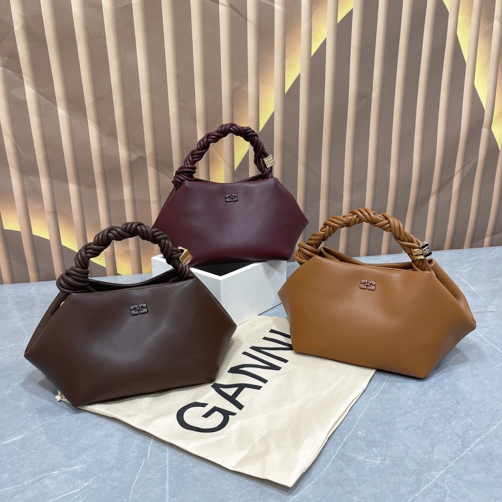 GANNI กระเป๋าถือถักหกเหลี่ยมหญิงกระเป๋า Messenger หนังแท้ High-End Niche Design Underarm Bag KVVU