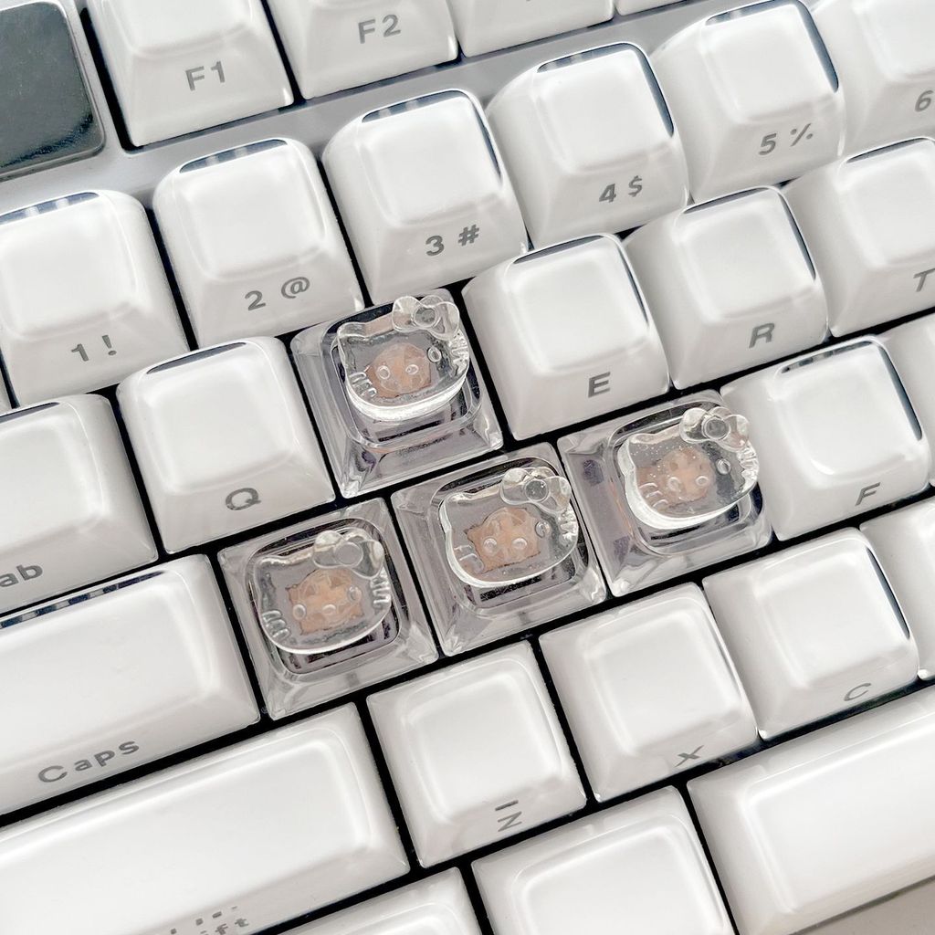 4 ชิ้นก้อนน้ําแข็ง KT Cat Keycaps 4 แพ็คที่กําหนดเองโปร่งแสงสีชมพูน่ารักและประณีต HelloKitty Series DIY Keycaps