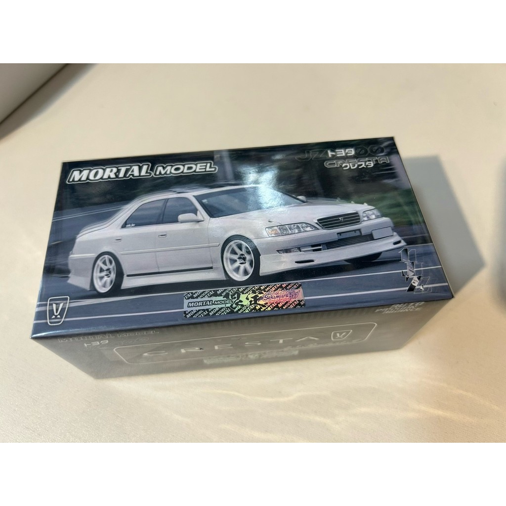ยี่ห้อใหม่ยังไม่ได้เปิด MORTAL รุ่น 1/64 Toyota CRESTA JZX100 สีขาวพร้อมกล่องเดิมอะไหล่ Complete All