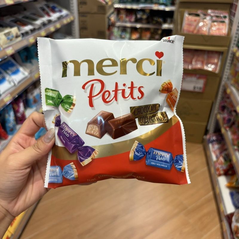 ฮ่องกง ไดโกว นําเข้าเยอรมนี Merci Petits Milk Nuts ถุงช็อคโกแลตเบ็ดเตล็ด 125g