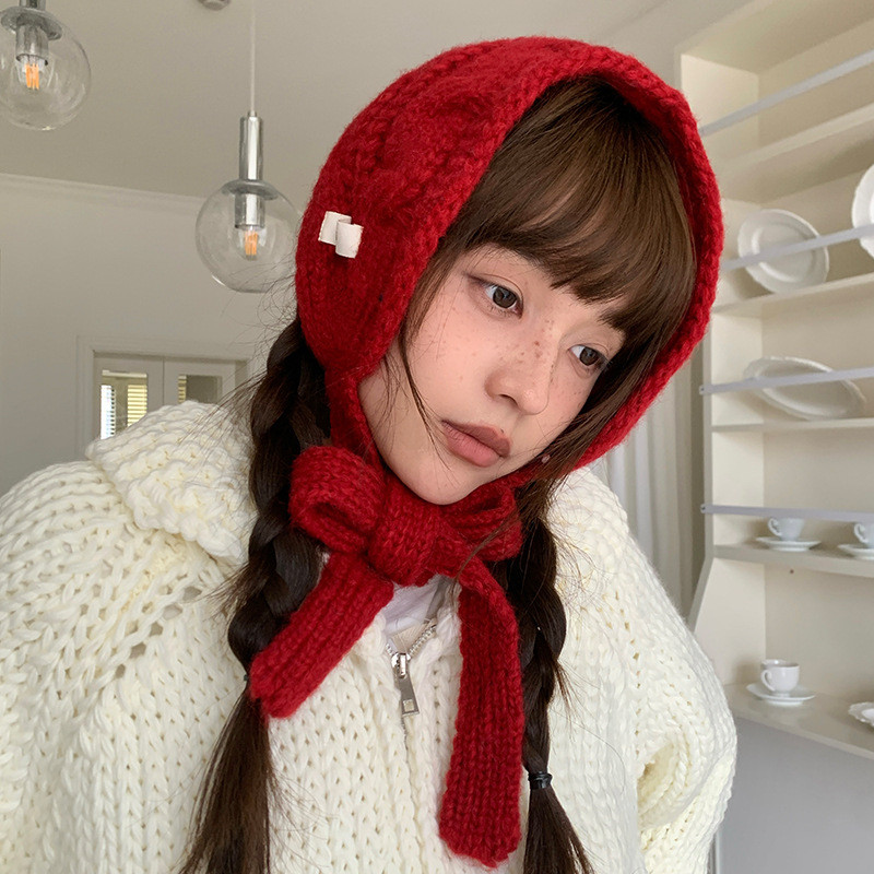 หมวกถักเกาหลีสีทึบสำหรับผู้หญิง ออกแบบมาเพื่อกันลมหนาว ปกป้องหูได้อย่างอบอุ่นในฤดูหนาว
