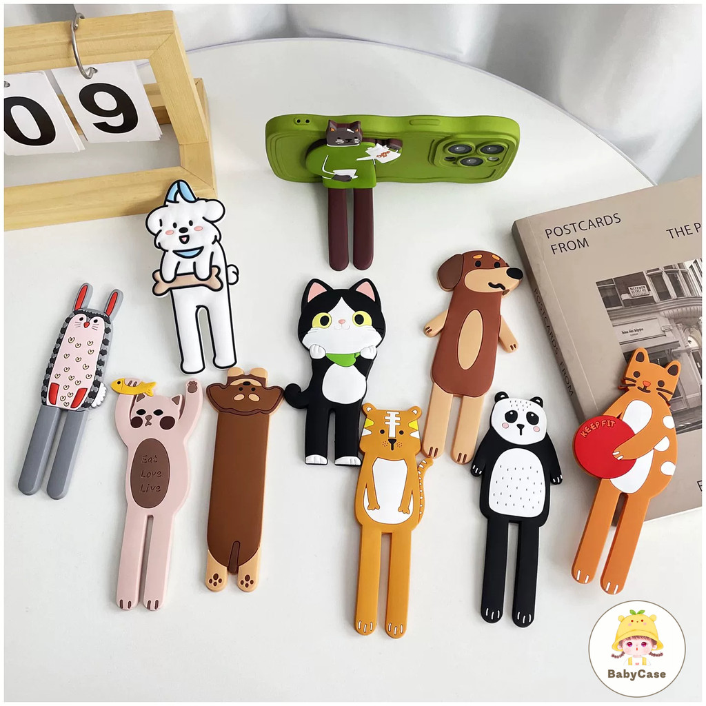 เคสโทรศัพท์รูปแมวและสุนัขแบบใหม่ที่สามารถเปลี่ยนรูปได้ ใช้ด้านหลังเคสโทรศัพท์เพื่อรองรับโทรศัพท์