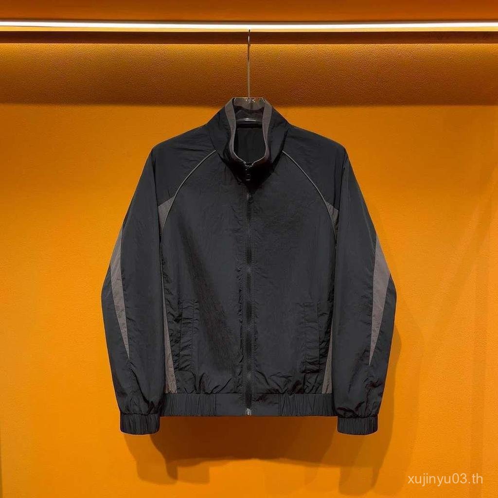 สไตล์ใหม่ผู้ชาย High-End Color-Blocking Stand-Up Collar Jacket แฟชั่น All-Match สไตล์เดียวกันหลวมสบา
