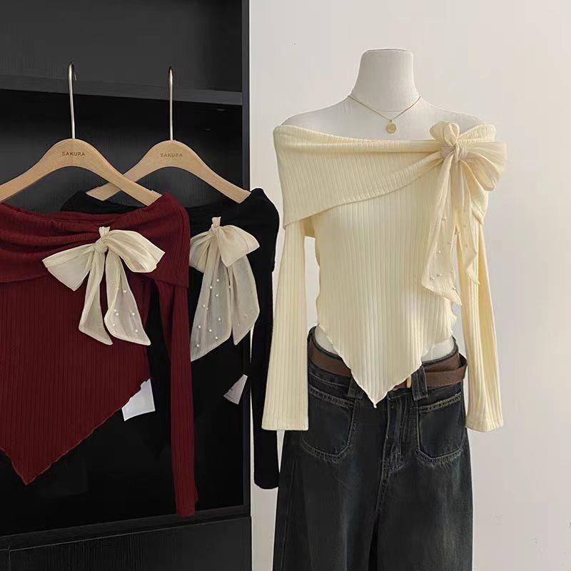 Chili Koko เสื้อสเวตเตอร์แขนยาวเปิดไหล่ผูกโบว์สีตัดกันสำหรับผู้หญิงในฤดูใบไม้ร่วงและฤดูหนาว ชายไม่เท่ากัน H033