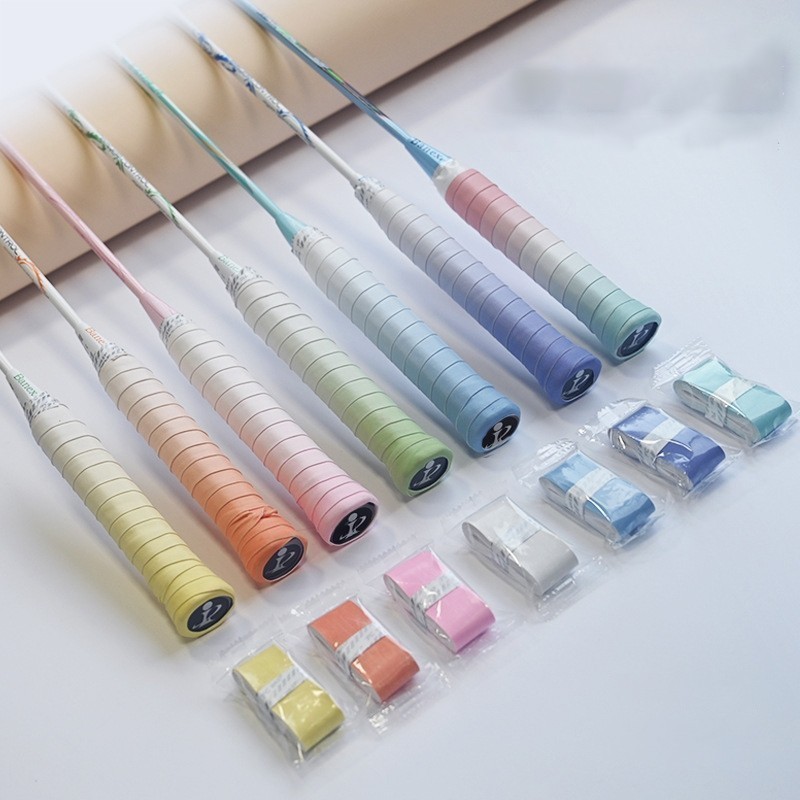 เทปพันด้ามจับแบดมินตันกันเหงื่อหลากสีสีพาสเทลที่มีอยู่