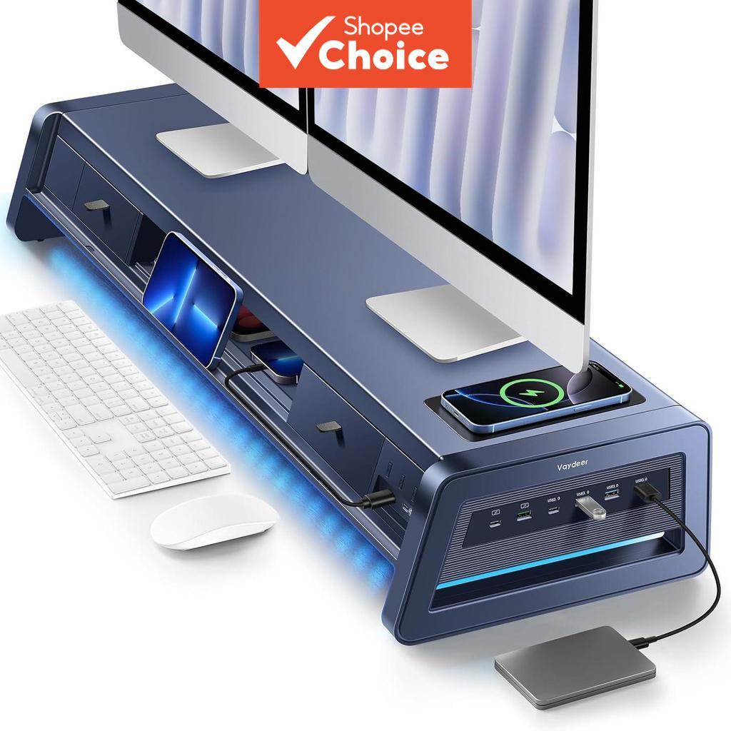 Vaydeer ขาตั้งจอมอนิเตอร์คู่แบบ All-in-One พร้อมลิ้นชัก 2 ช่อง พอร์ต USB 8 ช่อง และแผ่นชาร์จไร้สายพร้อมแถบไฟ LED สําหรับจอมอนิเตอร์ 2 เครื่อง จัดระเบียบโต๊ะคอมพิวเตอร์สําหรับ PC และ iMac