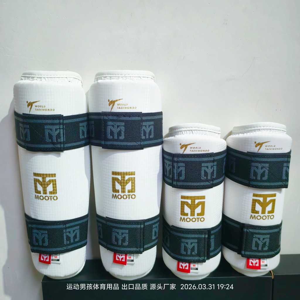 นวมชกมวย ชกมวยไฟฟ้า เป้าชกมวย จัดส่งฟรีของแท้ MOOTO Taekwondo Arm Guard Taekwondo Leggings Gold Labe