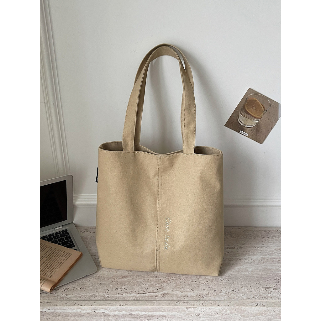 กระเป๋าผ้า tote bag Simple Casual Letter กระเป๋าผ้าใบปักหญิง 2026 สไตล์ใหม่ความจุขนาดใหญ่พร้อมซิปไหล่ Commuter Tote Bag