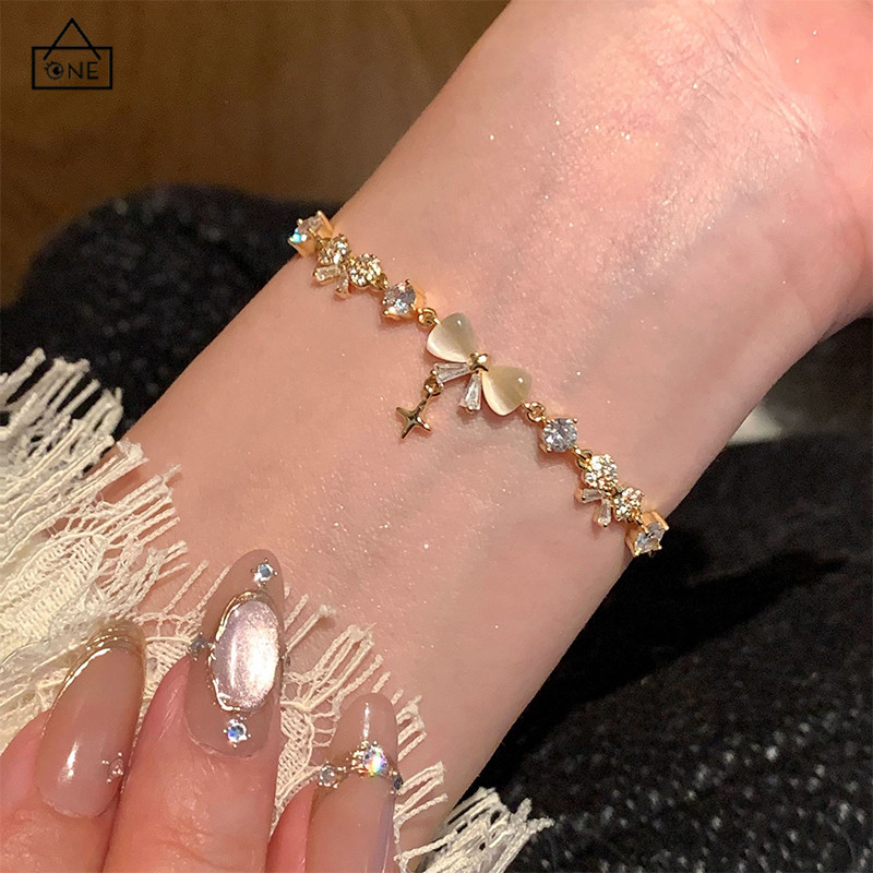 COD❤️สร้อยข้อมือโบว์ดาวตกสำหรับผู้หญิง ดีไซน์ไฮเอนด์ เรียบง่าย มีสไตล์ เรียบง่าย เท่ห์-a.one
