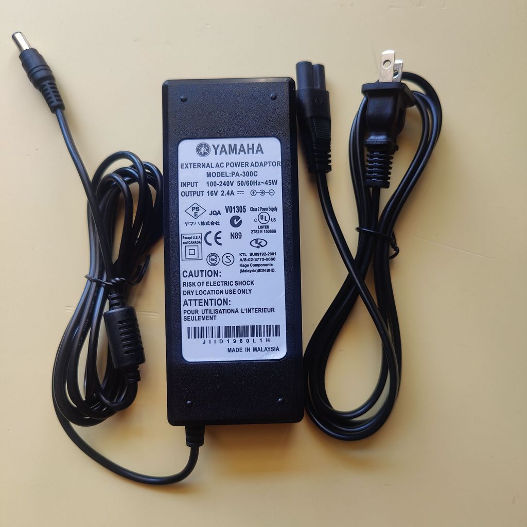 เหมาะสําหรับ YAMAHA YAMAHA คีย์บอร์ดอิเล็กทรอนิกส์ PSR-S670 S770 S970 สายไฟอะแดปเตอร์เครื่องชาร์จ 16