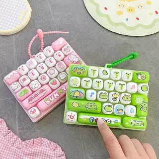 (GOOD) 26 กริดความเครียดบรรเทา Fidget พวงกุญแจสัตว์รูปแบบจําลองคีย์บอร์ดแบบพกพา Sensory ของเล่นสําหรับเด็ก Party Favors (ใหม่)