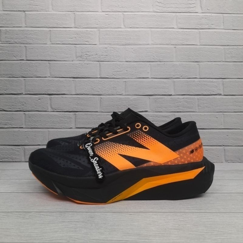 New Balance SC Elite V4 "Black and Yellow" รองเท้า JBGC
