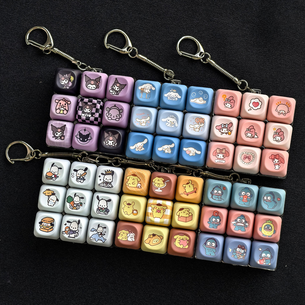 MAIMOOO Sanrio Keycap จี้ความเครียดบรรเทาของเล่น 9 ชิ้น Mini คีย์บอร์ดพวงกุญแจน่ารัก Butter Bear Pingu Kuromi Melody Pompompurin Keycap พวงกุญแจ