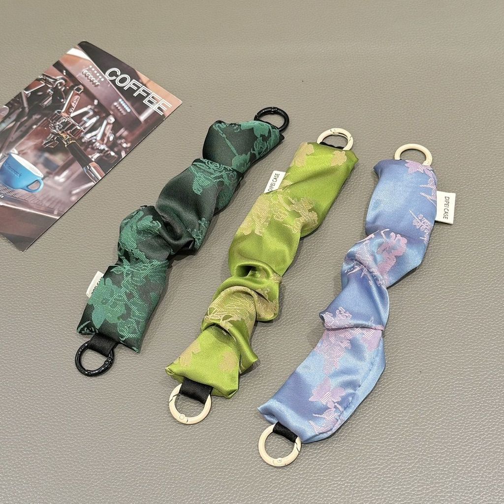 2025 ใหม่สไตล์ผ้าพันคอข้อมือสายคล้องคอเชือกเส้นเล็กสลิงโซ่โทรศัพท์มือถือสร้างสรรค์สากลเครื่องประดับแ