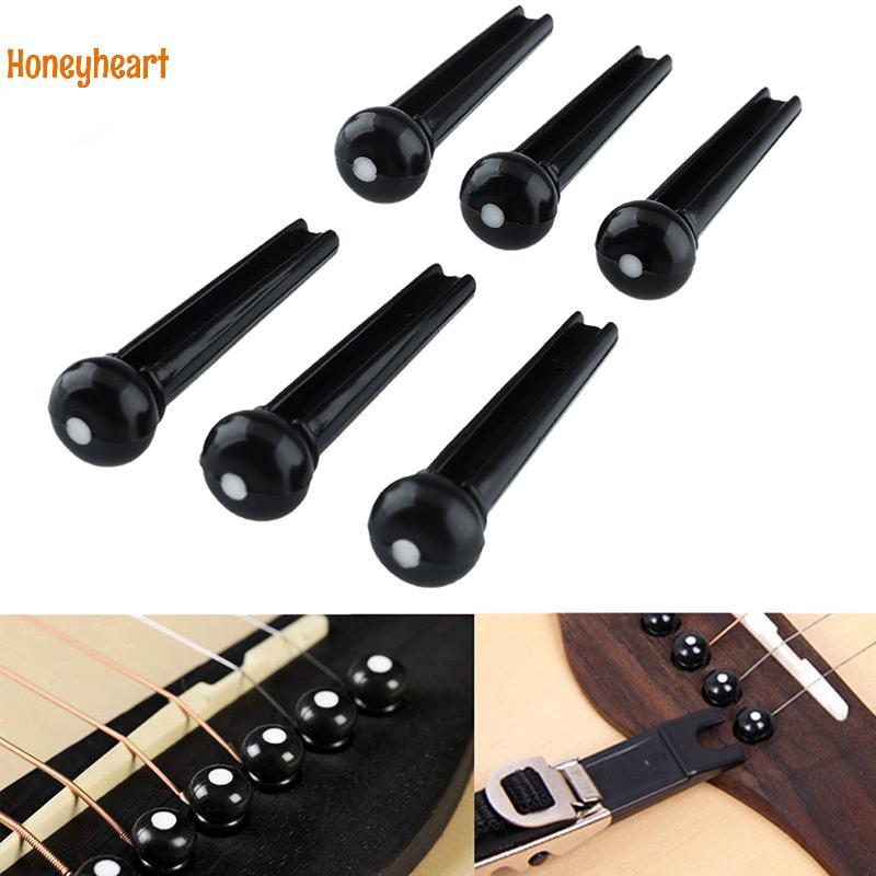 <Honeyheart> ชุด 6 ชิ้น Bla Ebony Bridge Pins พร้อมจุดเชลล์สําหรับกีตาร์อะคูสติกคุณภาพ
6 ชิ้น Ebony 