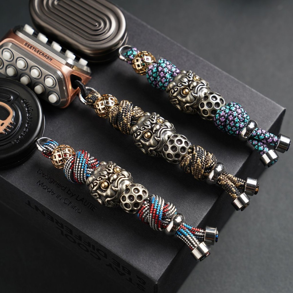 อุปกรณ์ของเล่นคลายการบีบอัด, จี้พาราคอร์ดทอมือ, อุปกรณ์กระเป๋า, อุปกรณ์ของเล่น EDC