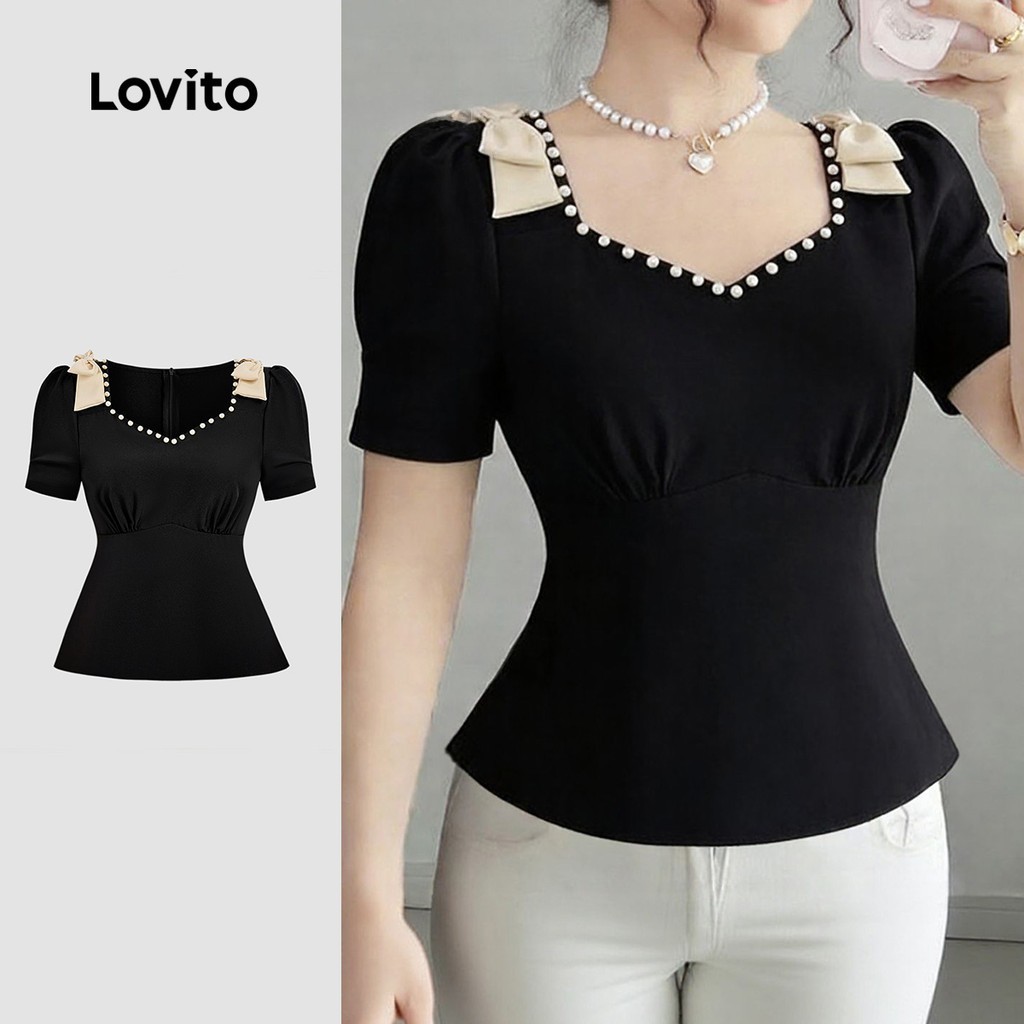 Lovito เสื้อเชิ้ตผู้หญิงสีดําฤดูใบไม้ผลิ/ฤดูร้อน ประดับโบว์และไข่มุก ดีไซน์บล็อกสี LBL33049