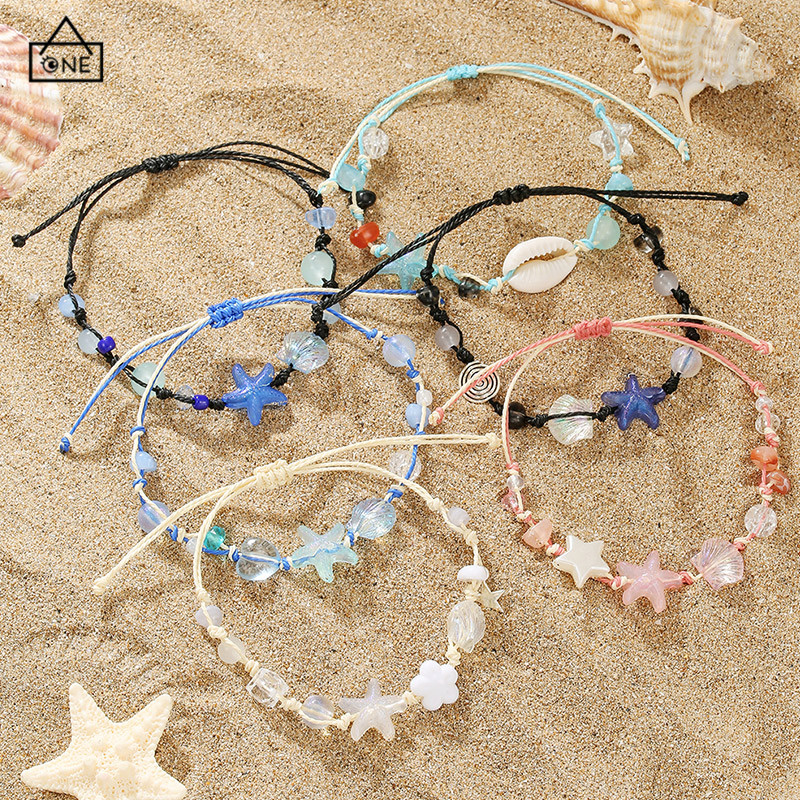 COD❤️สร้อยข้อมือแบบถักเปลือกหอยสไตล์มหาสมุทร ปรับได้ ลูกปัดข้าวสไตล์โบฮีเมียนสำหรับผู้หญิง-a.one