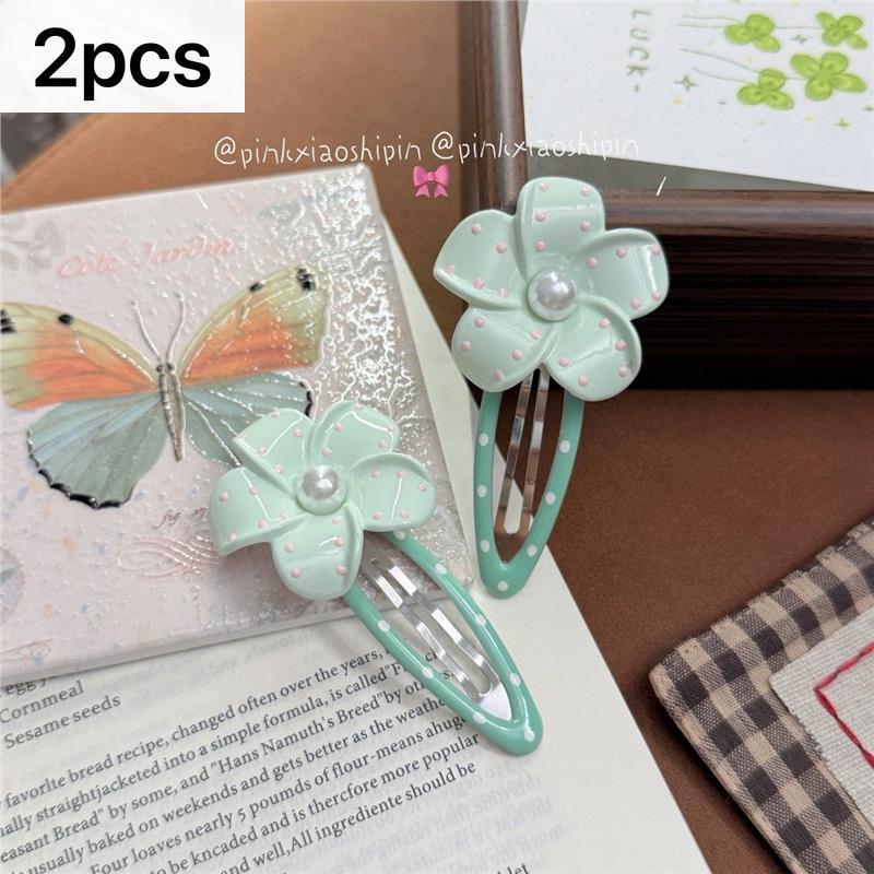 Mint Green Polka Dot Frangipani คลิปบีบีขนาดใหญ่ คลิปข้างดอกไม้มุกอ่อนโยนสด
