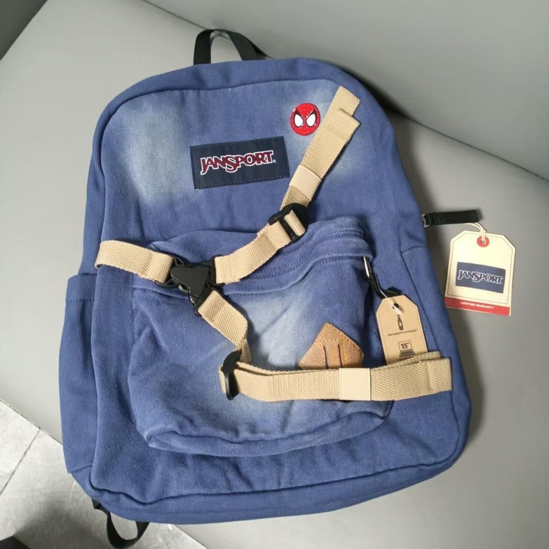 JanSport Jesper Denim Spider-Man Garfield Andrew Backpack กระเป๋านักเรียนนักเรียนความจุขนาดใหญ่ลด Bu