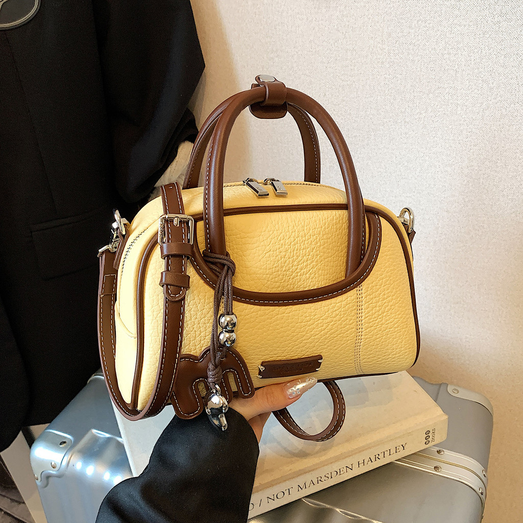 กระเป๋า cecelle perota brand Dream Forest Niche Bag Korean Contrast Color Portable Bowling Bag Femal