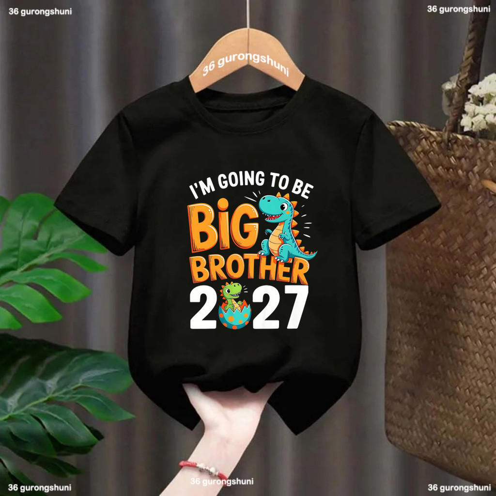 IM GOING TO BE BIG BROTHER 2027 การ์ตูนไดโนเสาร์รูปแบบพิมพ์ชาย Tshirt เด็กฤดูร้อนแขนสั้นเสื้อยืด Big