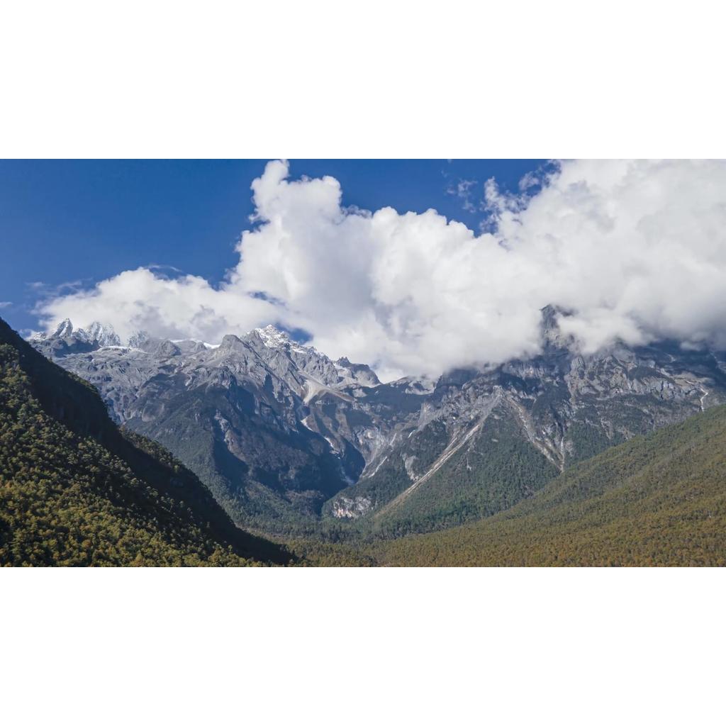 Lijiang Lanyuegu Yulong Snow Mountain ภาพถ่ายทางอากาศวัสดุวิดีโอหน่วงเวลา