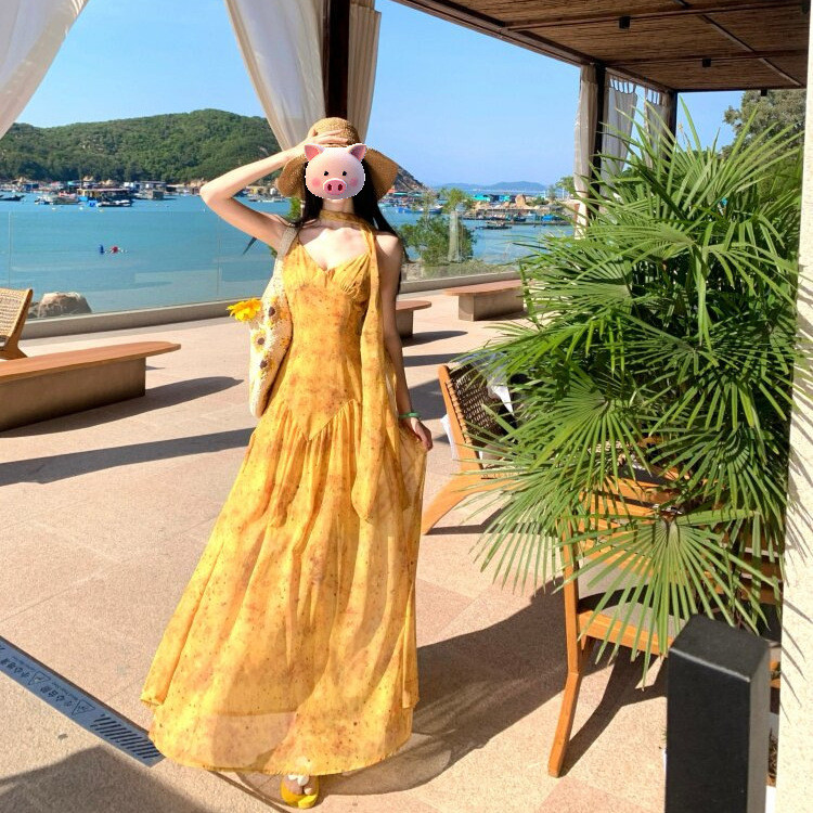 8.24-วันหยุดชายทะเลชิ้นดอกไม้สีเหลืองชุดสลิงหญิงฤดูร้อนชาฝรั่งเศสแบ่งที่สวยงามเฉพาะอารมณ์ยาว