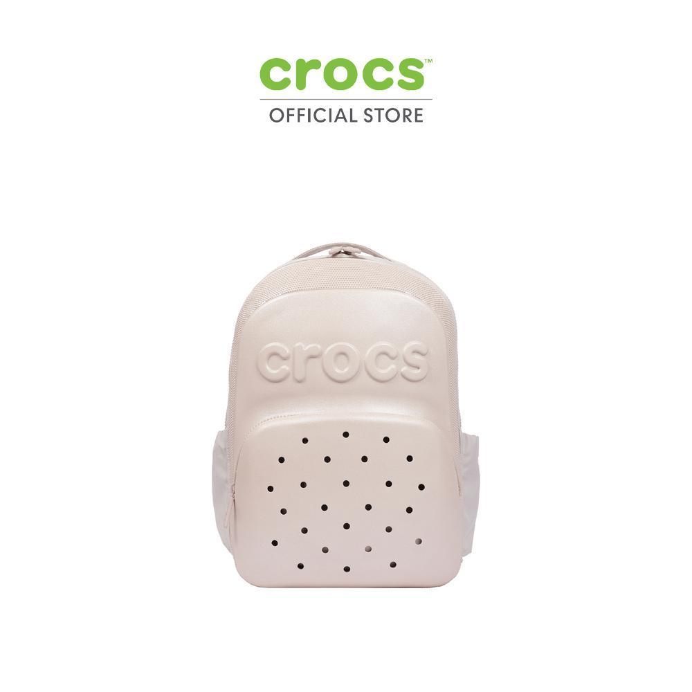 CROCS กระเป๋า CLASSIC GLITTER BACKPACK - COCOA CREAM