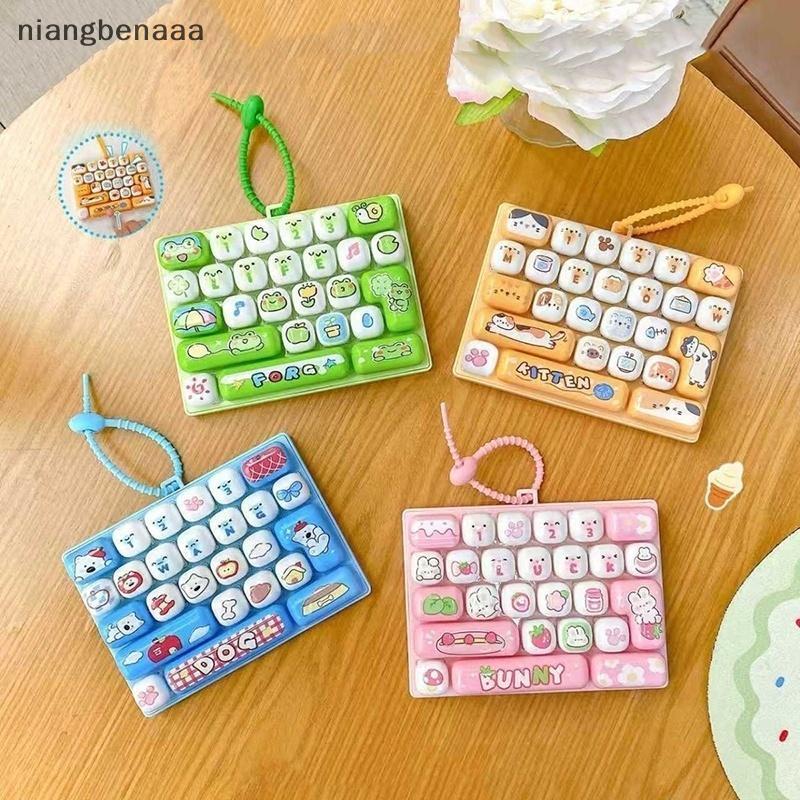 (niangbenaaa) 26 กริดความเครียดบรรเทา Fidget พวงกุญแจสัตว์รูปแบบจําลองคีย์บอร์ดแบบพกพา Sensory ของเล่นสําหรับเด็ก Party Favors ใหม่