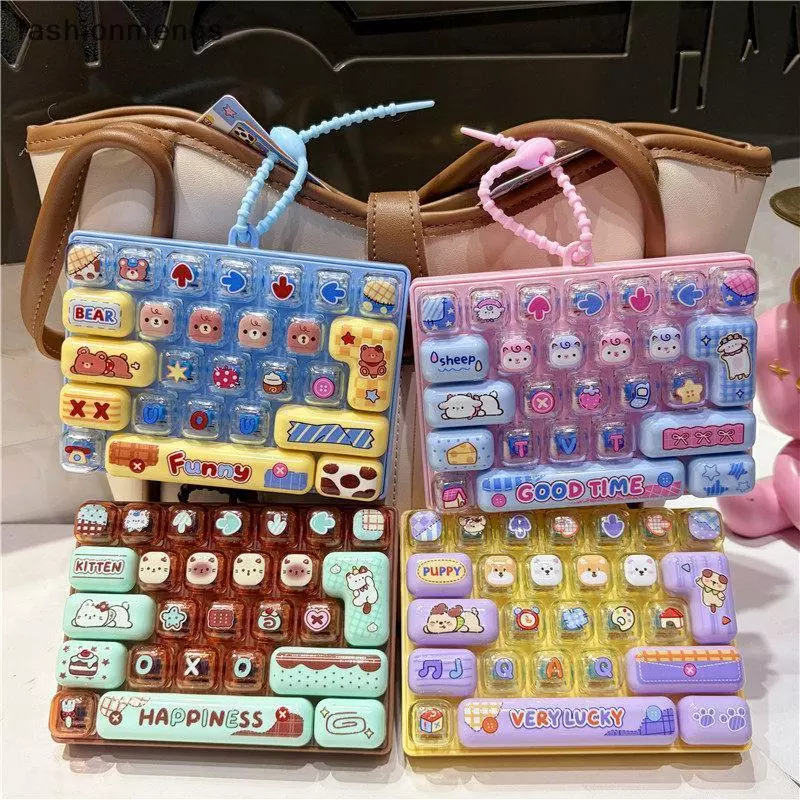 (GOOD) น่ารัก Anti-Stress Dpression ของเล่น 26 คีย์ Fidget ปุ่มของเล่นกระเป๋ากันน้ําจี้สําหรับผู้ใหญ่ความวิตกกังวลบรรเทา (ใหม่)