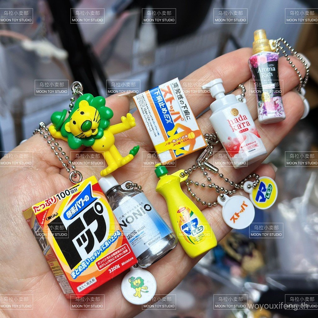 {Ura} ญี่ปุ่น NONIO ญี่ปุ่น NONIO เจลอาบน้ํา น้ํายาปรับผ้านุ่ม Antidiarrhea Agent แคปซูลของเล่นจี้
