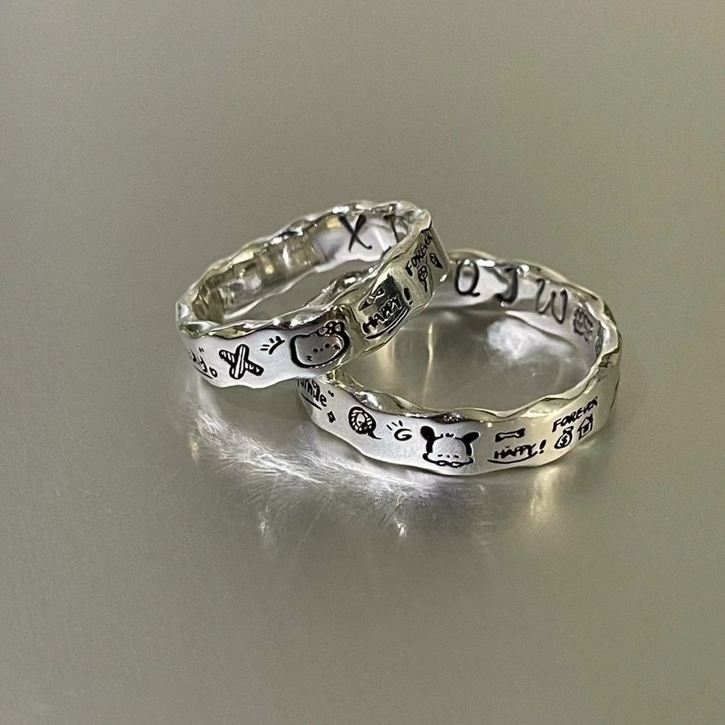 แหวนโลหะผสม kt Cat Pacha Dog Graffiti Ring Niche Design น่ารักการ์ตูน Wavy Side Ring สไตล์คู่