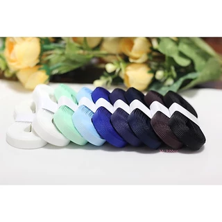 ริบบิ้นผ้ากรอสเกรน ขนาดหน้ากว้าง 0.6 cm ยาวม้วนละ 5 หลา มีให้เลือก 64 สี