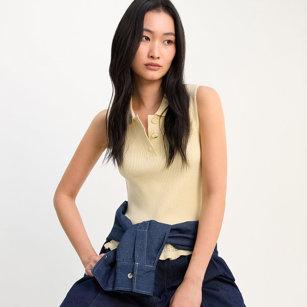 [Pomelo] เสื้อโปโลผ้าถักลายริ้วแต่งระบายชายเสื้อ / Ruffle Hem Detailed Knit Top